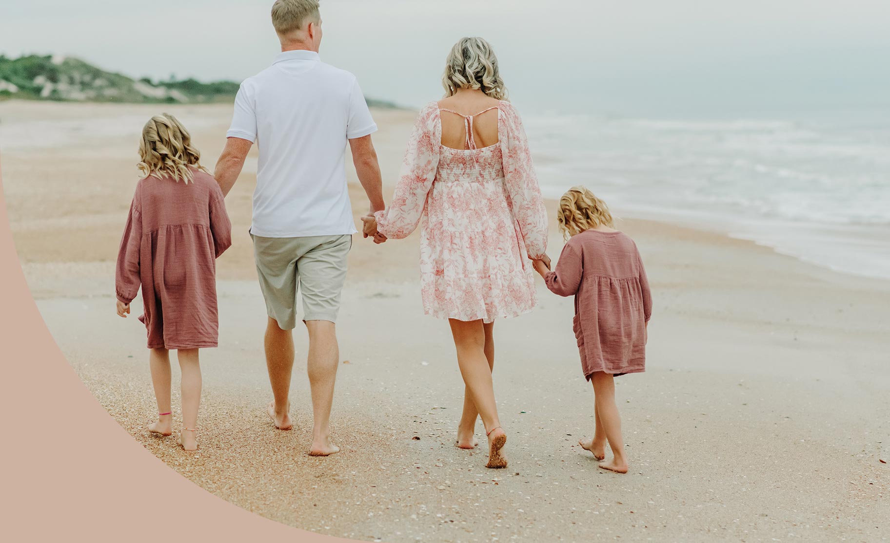 Family walking on the beach